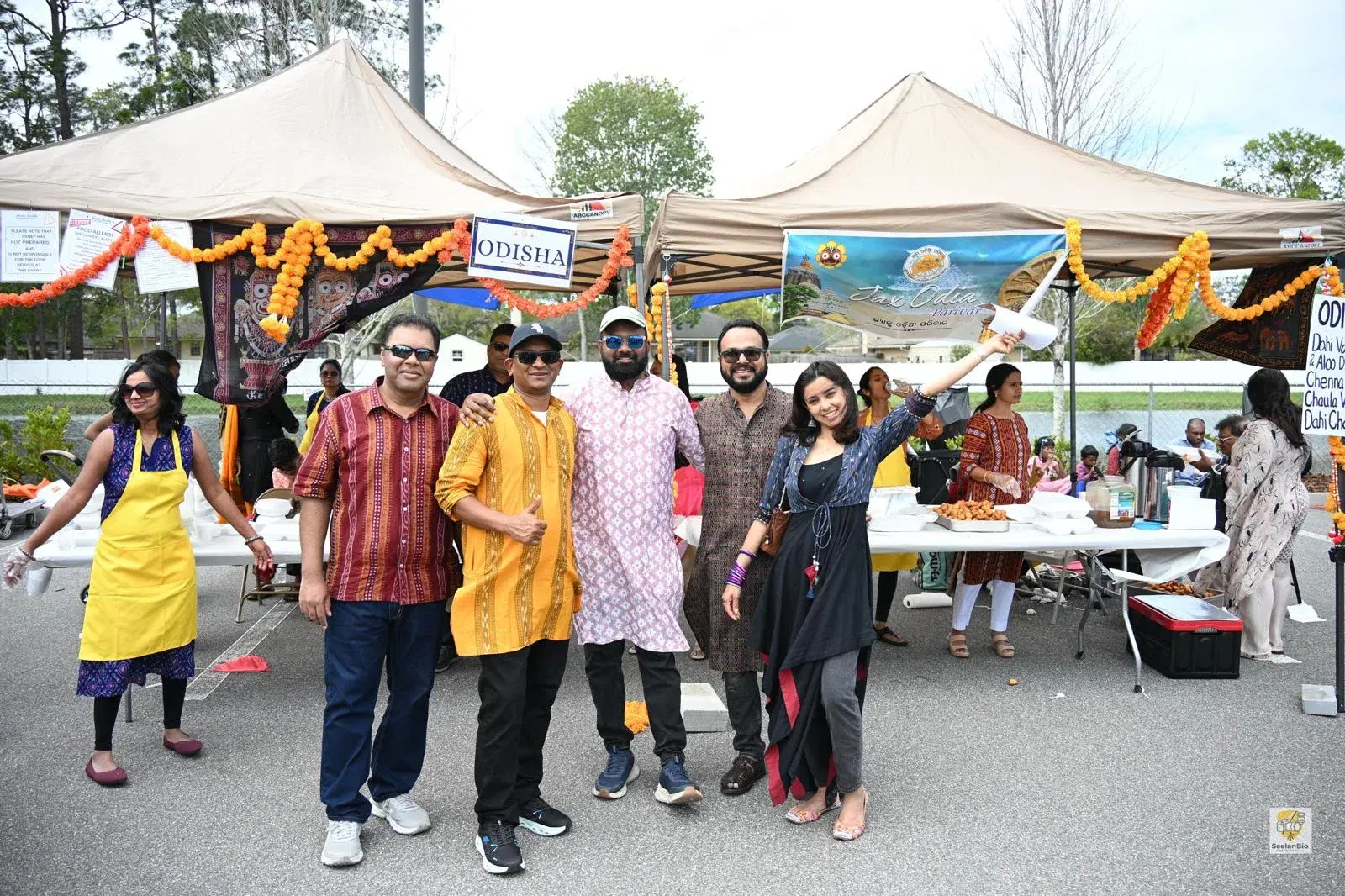 Families gathered at Anand Bazar fundraising fair