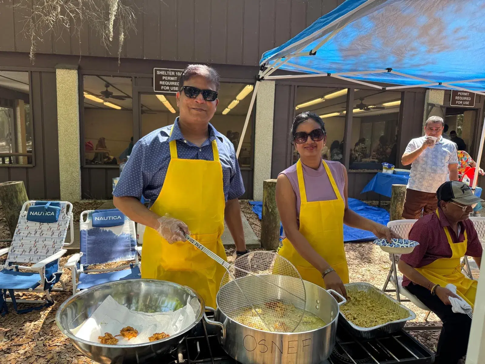 OSNEF volunteers cooking together at the Odia picnic